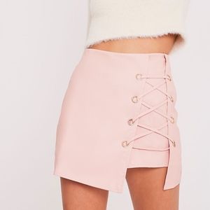 CHANELLA BLUSH FAUX LEATHER EYELET LACE UP SKORT